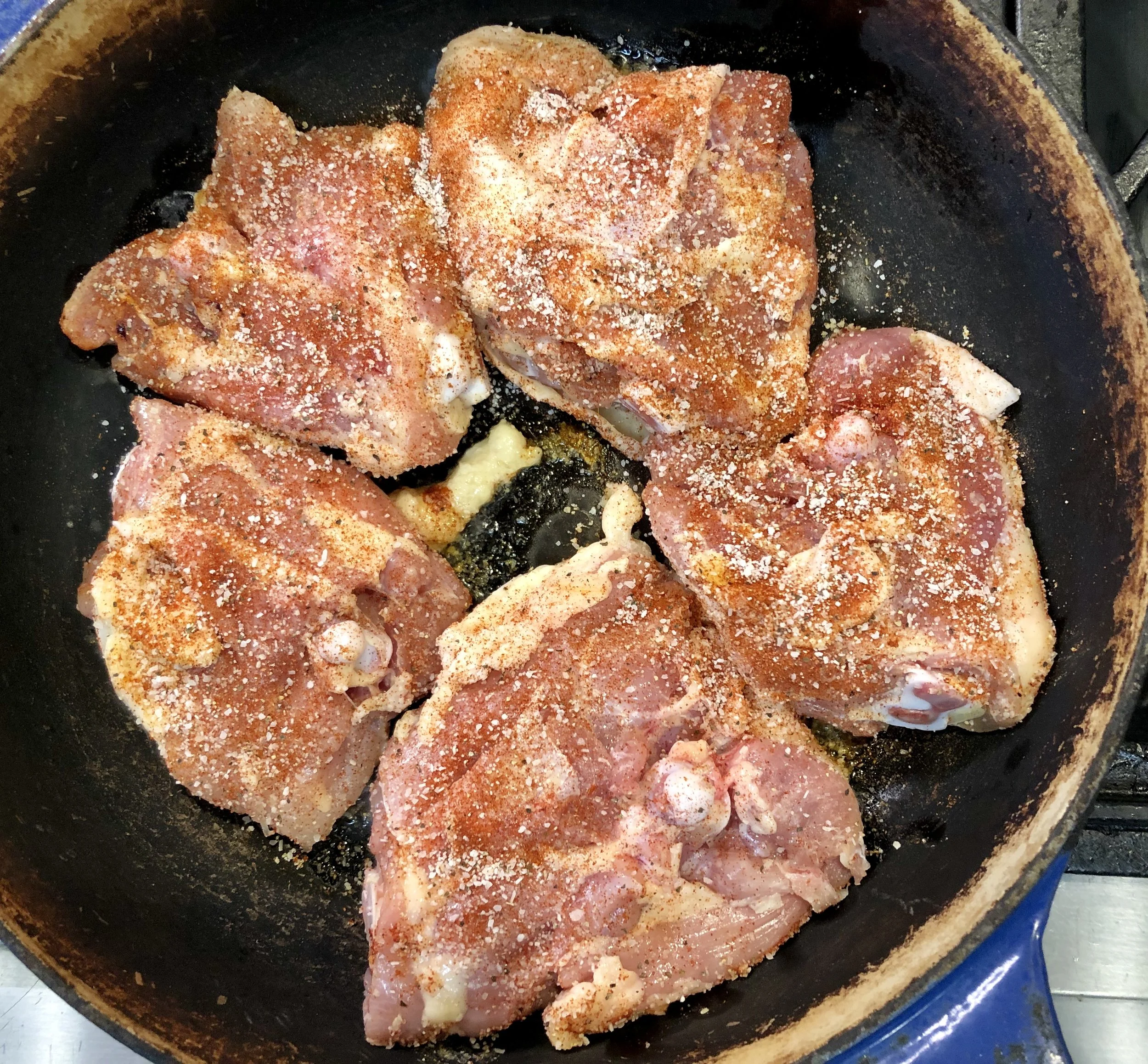 Starting the thighs out in a cold pan to render.