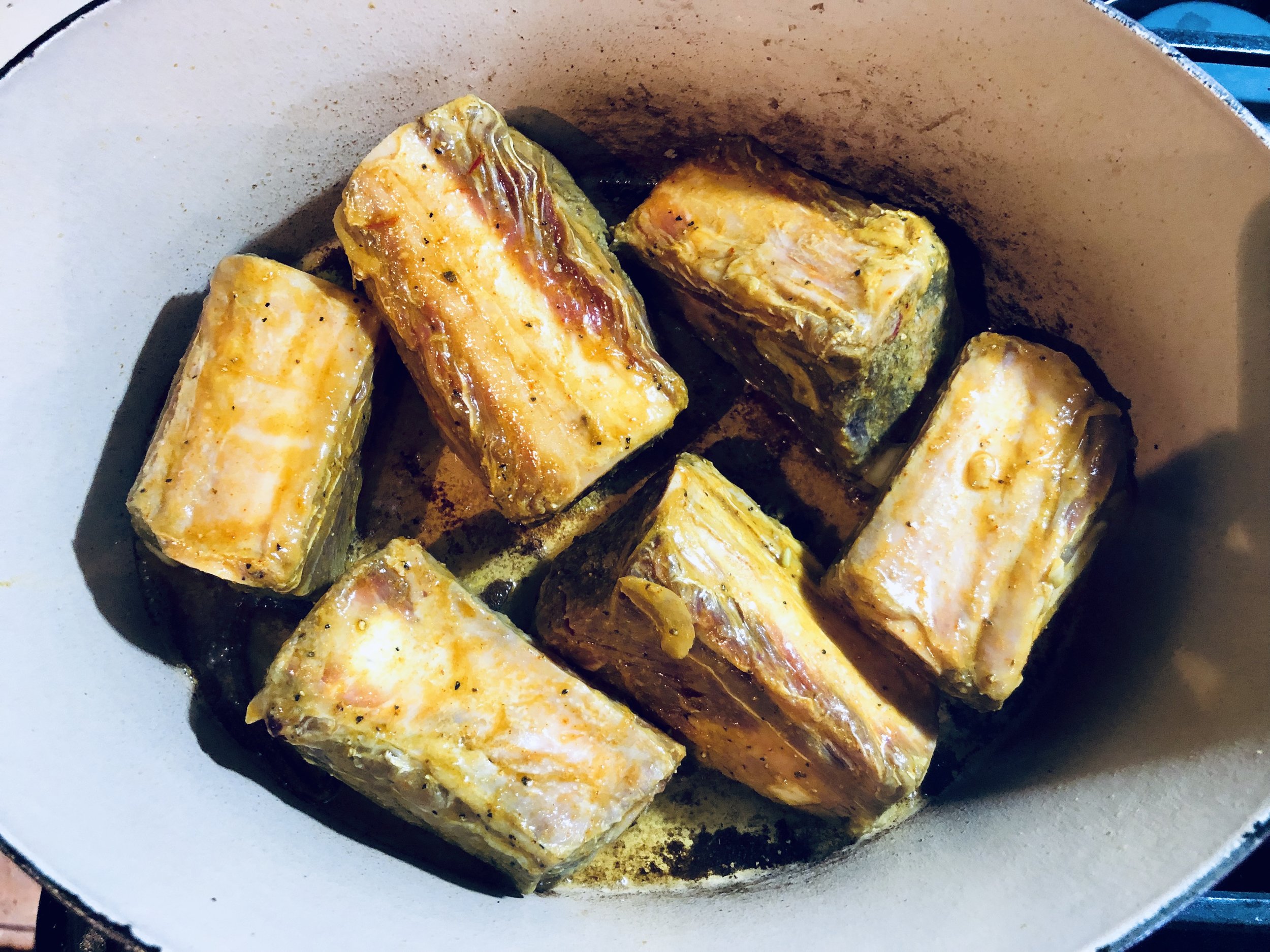 Browning the short-ribs.