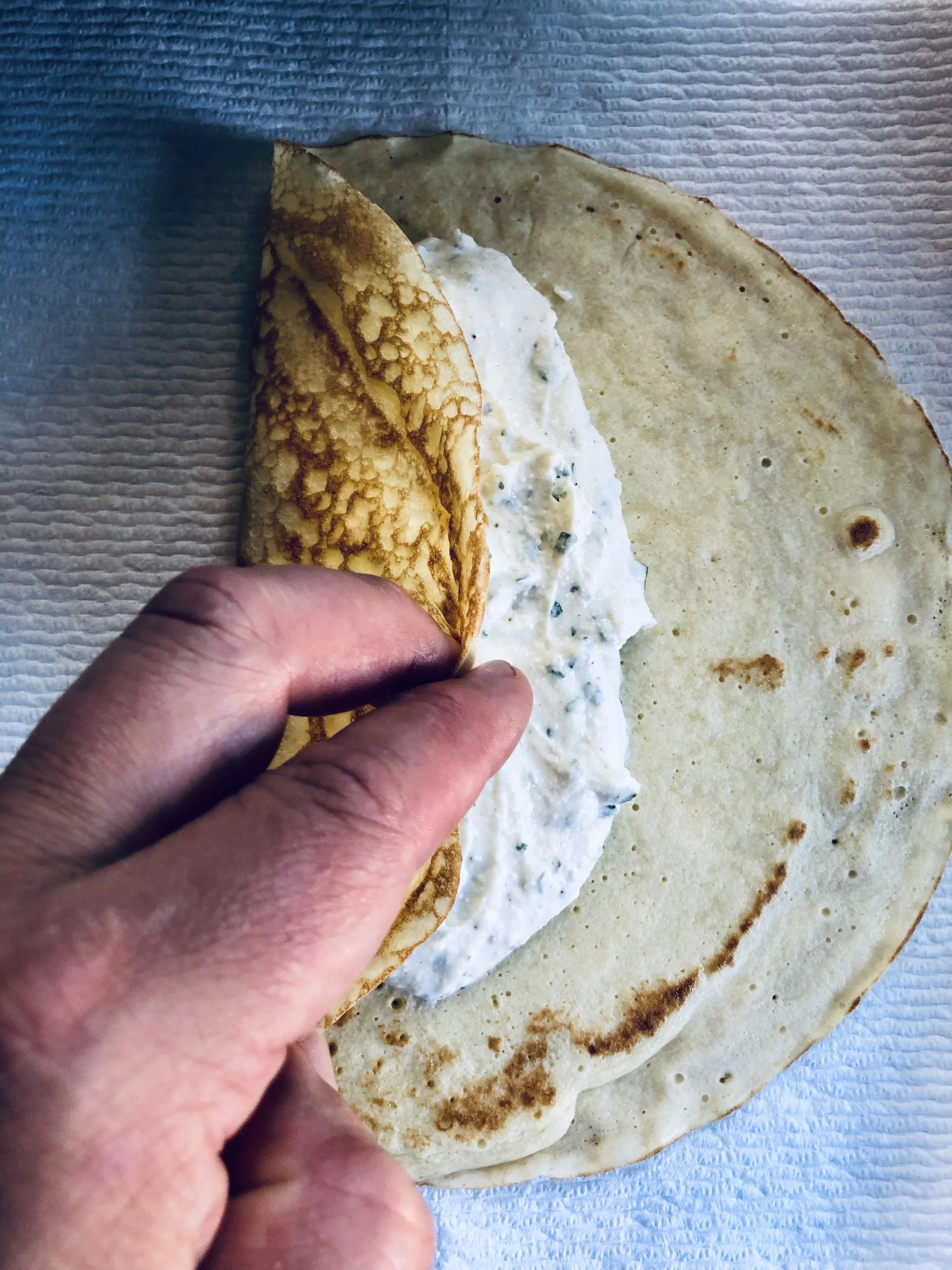 Filling the crepes.