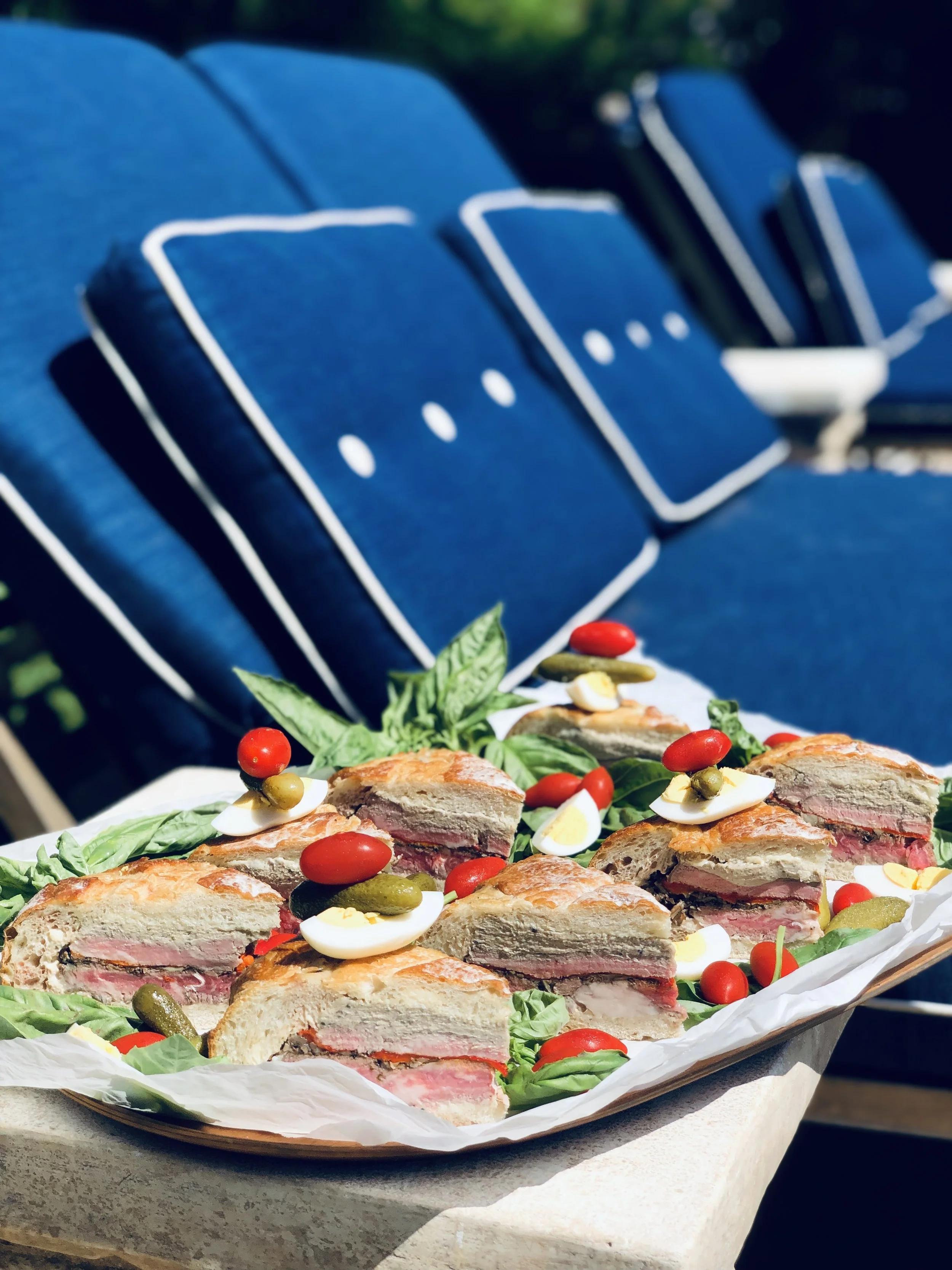 Add cornichons, hard cooked eggs, and other summer delights to finish off the presentation! You’re ready for an easy, hand held, grab and go meal!