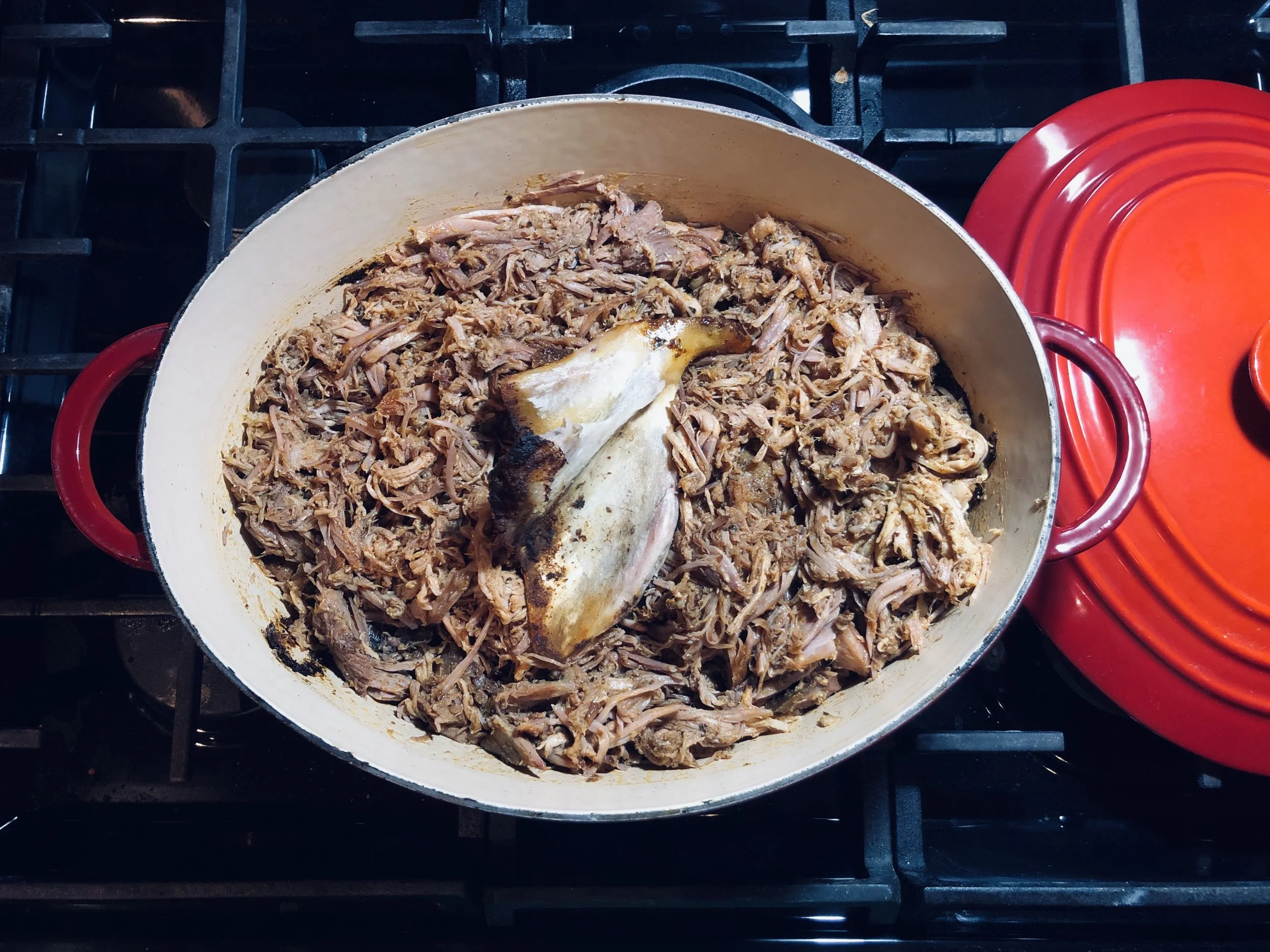 Shred the pork while tossing it around in the roast au jus and fat. Delicious!