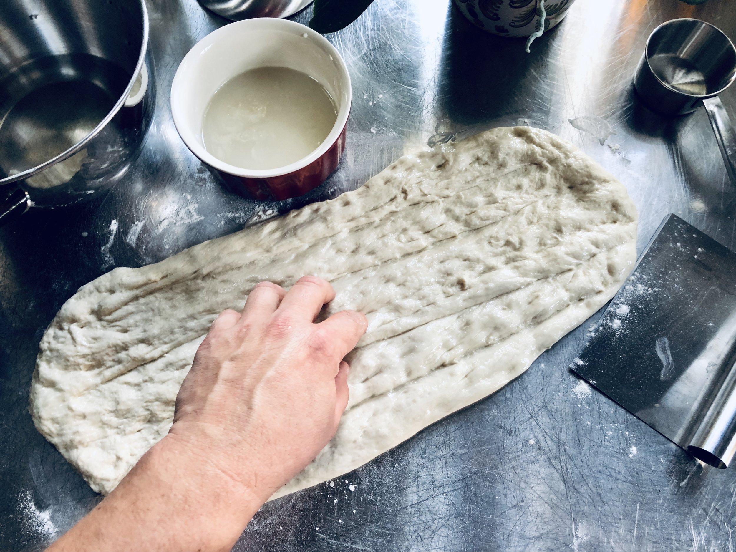 Your hands and fingers are the best tools when making barbari bread!