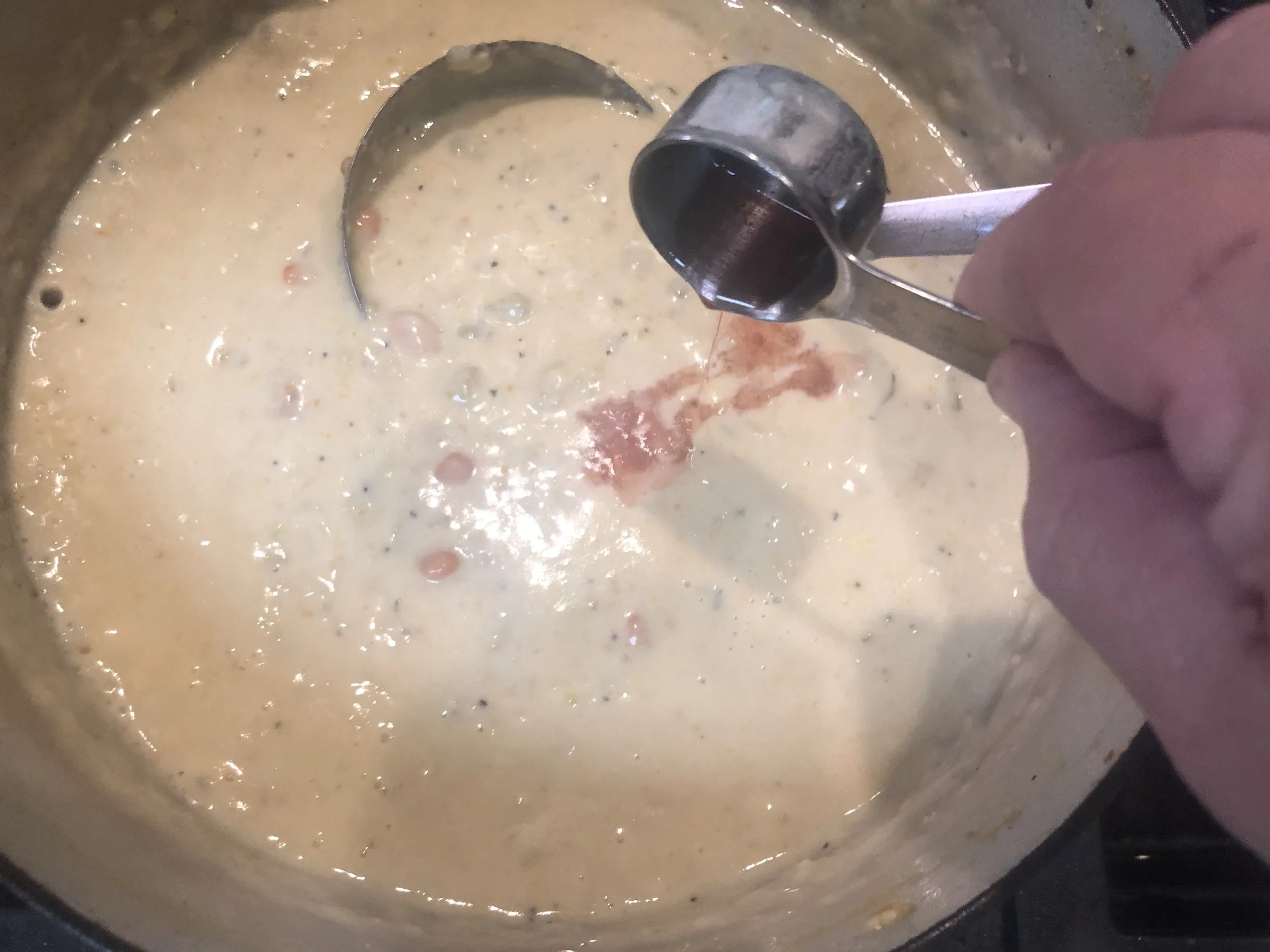 Adding red wine vinegar at the ver end lifts and flavors the chowder.
