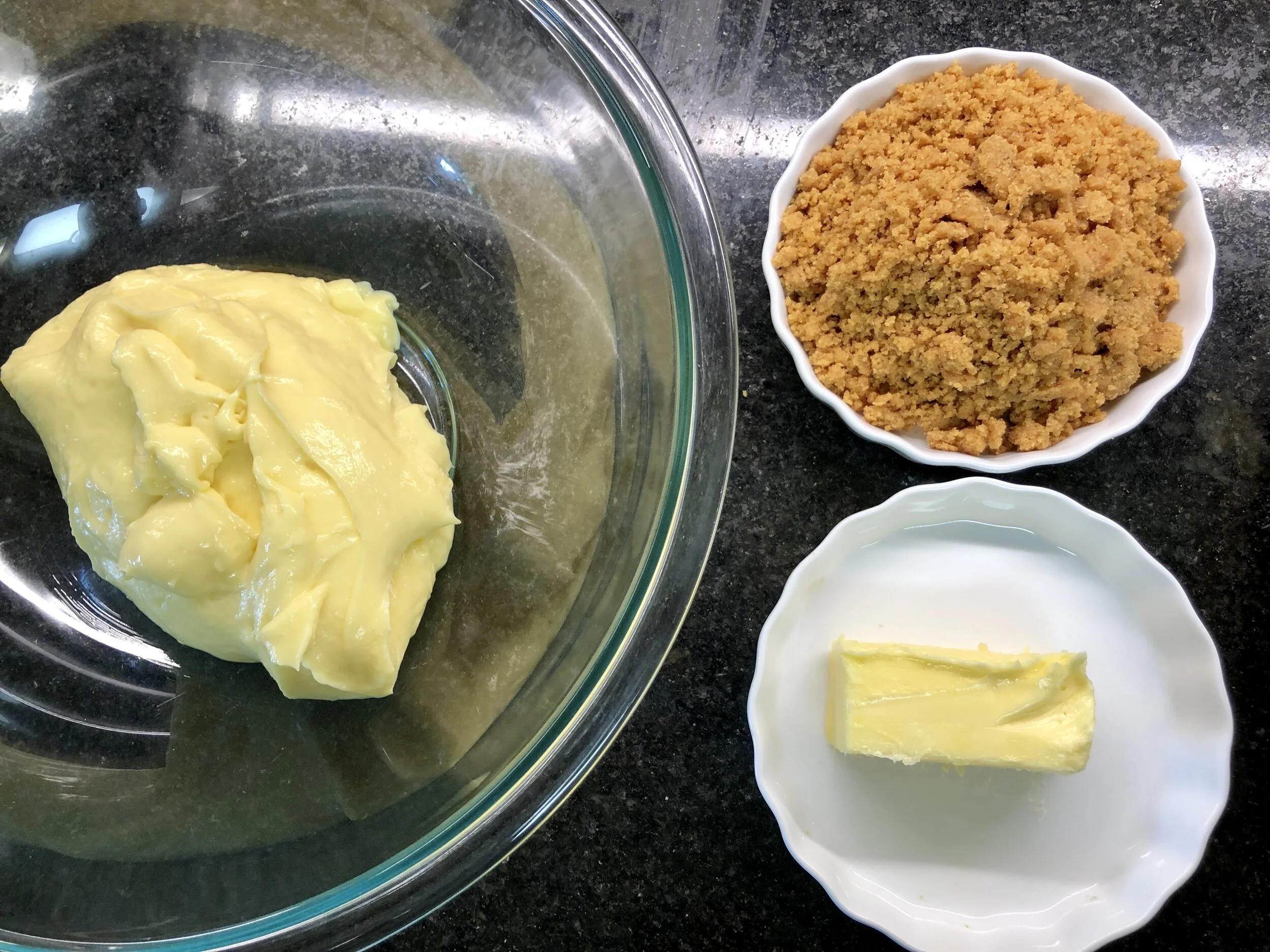 Pastry cream, praline paste, and softened butter.