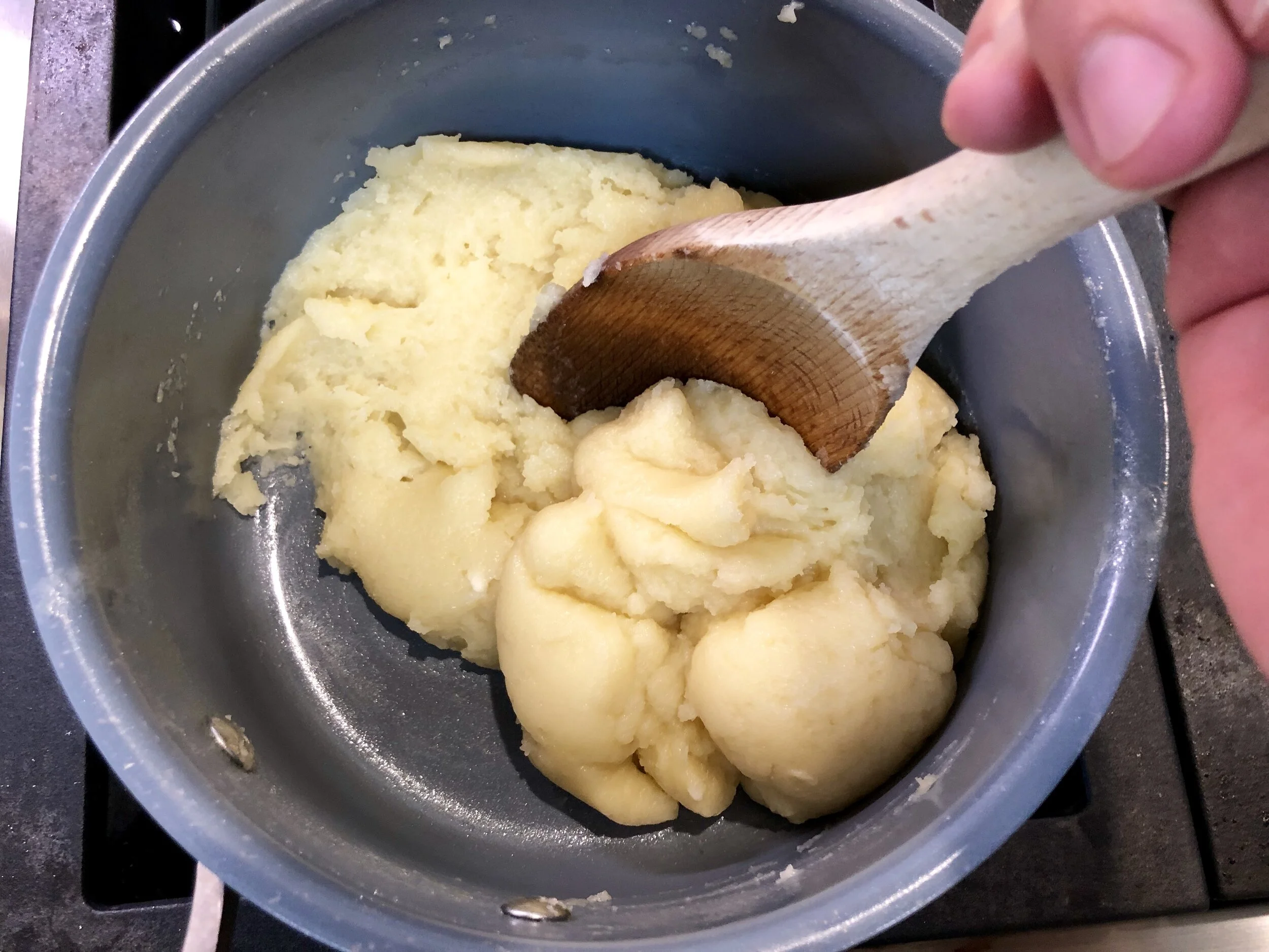 Mix and continue cooking in the pan.