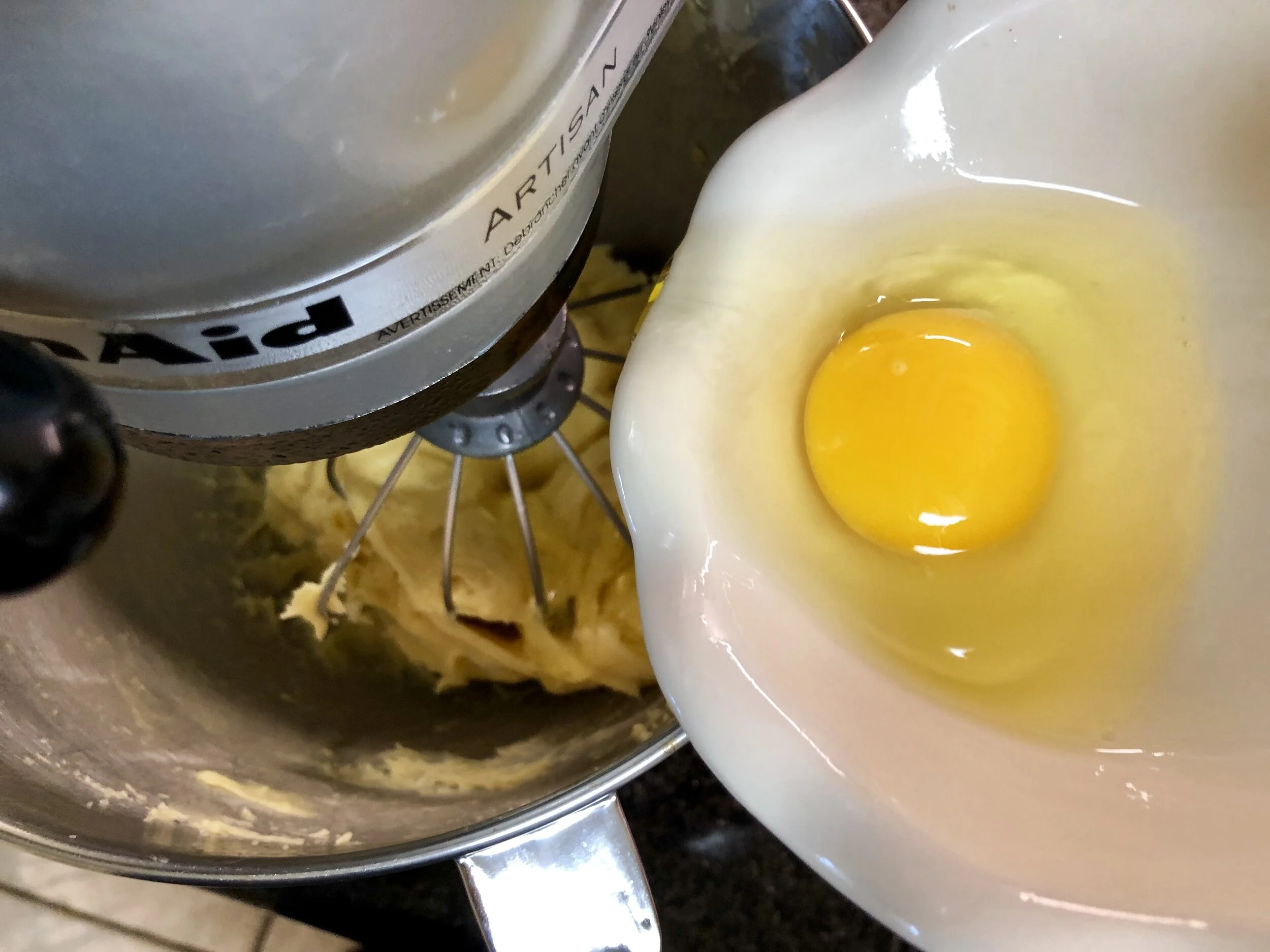Add the eggs one at a time and mix until smooth.