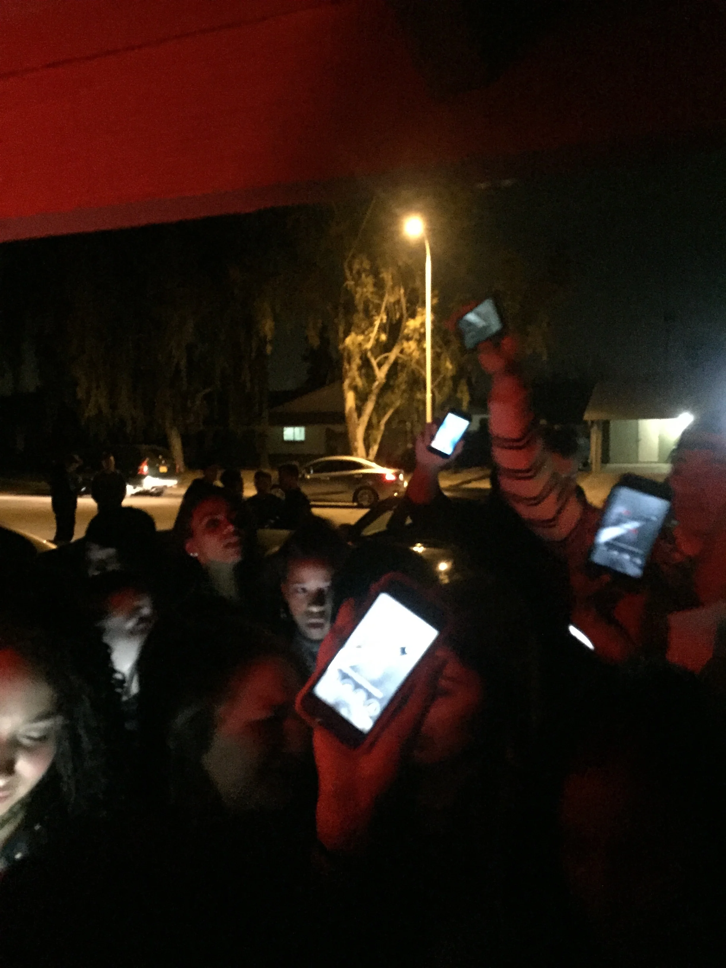 Anxious party-goers flashing the Had app at the door!