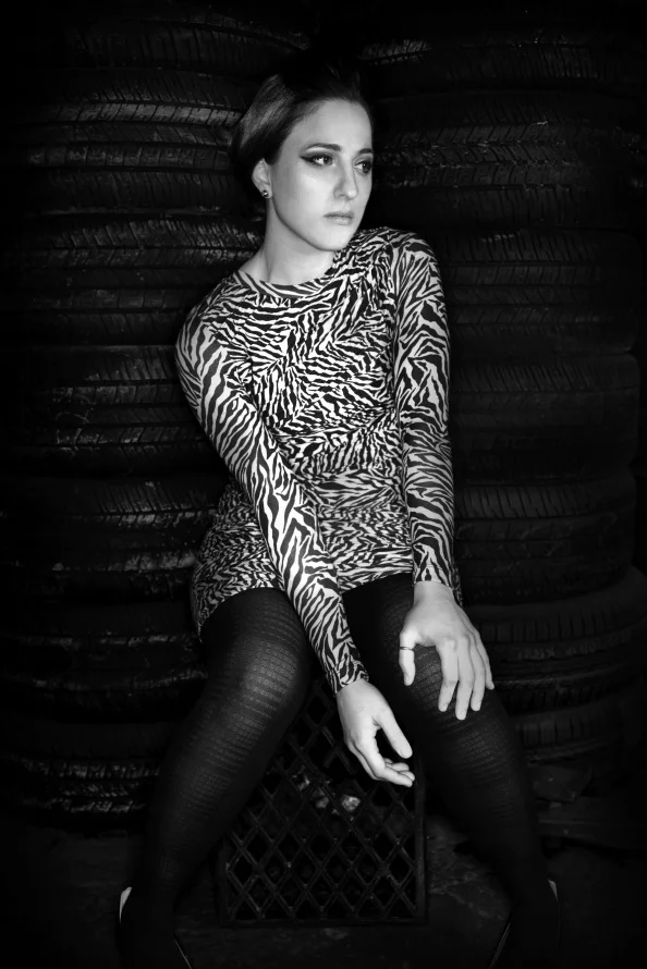 krissy-sitting tires.jpg