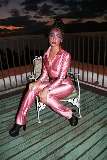Photo Credit: Dandilion Wind Opaine. Vintage Catsuit