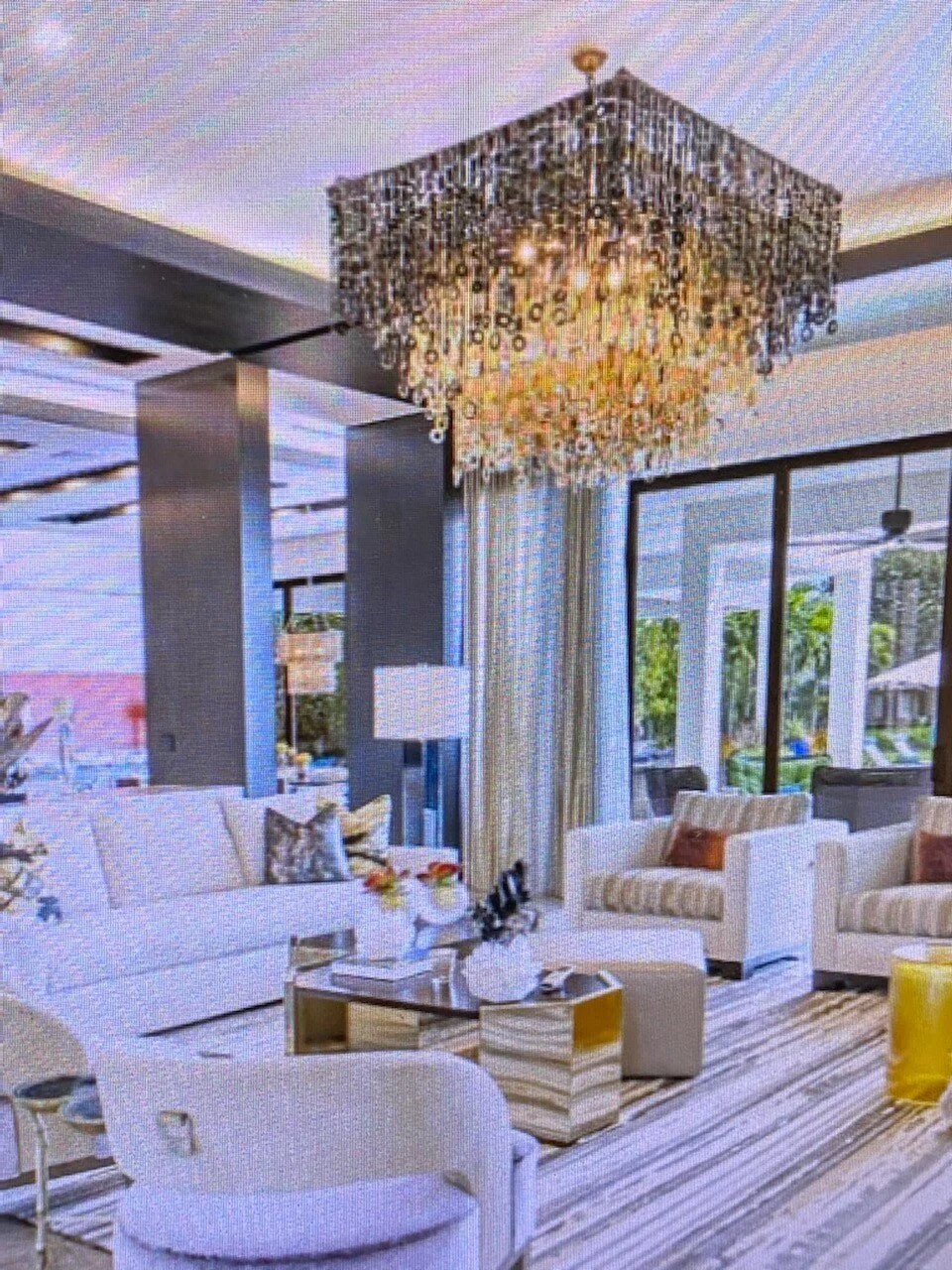 dira-nguni-cow-horn-10-light-chandelier 10.jpeg