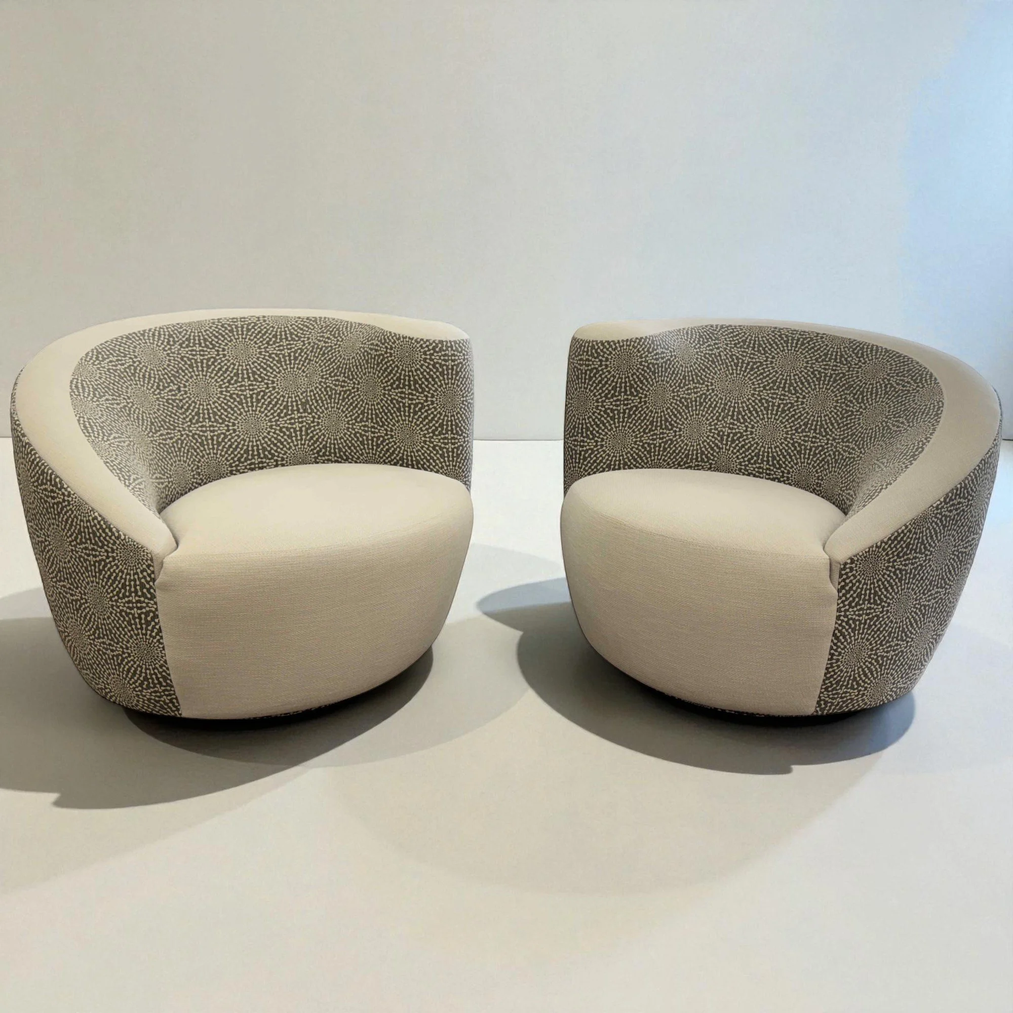 vladimir-kagan-for-lazar-industries-nautilus-swivvel-lounge-chairs-set-pair-of-2 00 studio.jpg