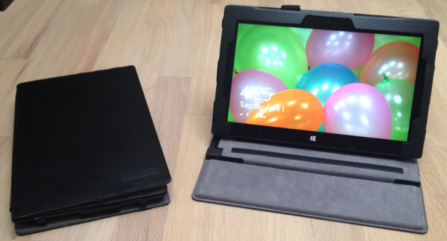 The closed ProKASE on the left with the thin cover and the open case with dock cover. The support is firm enough that it's possible to draw on the Surface Pro screen at this angle.