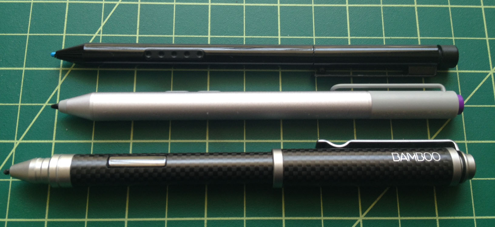 The new pen is the same length as the current Surface Pro stylus, but it is slightly wider and the required AAAA battery adds nice weight. The Wacom Bamboo Feel Stylus - Carbon is much longer with its cap on. The Bamboo's weight tends to tip toward the cap, whereas the weight of the new Surface pen feels nicely balanced. 