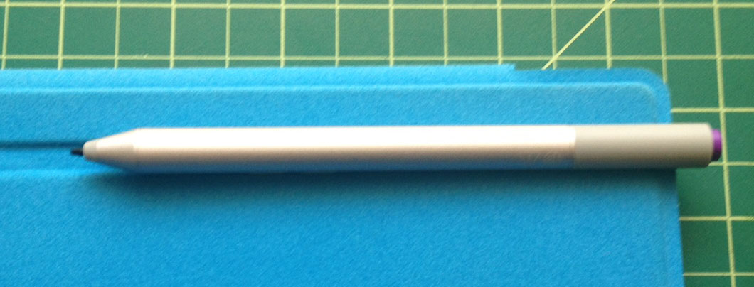 The type cover has a groove near the connector edge that is a nice alternative to the pen loop.