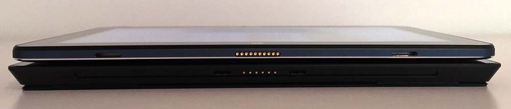 The Cube i7 Book is significantly thinner than the Surface Pro 2 and is fanless.
