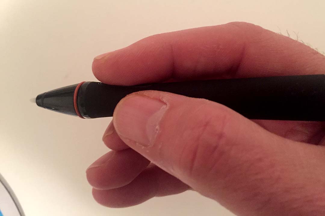 The contoured pen is very comfortable to hold, but the hard plastic tip demands a screen protector.