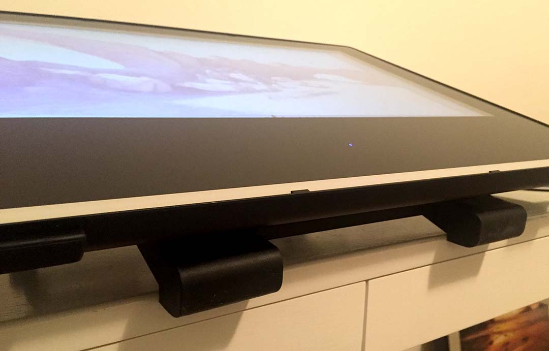 The rubber desk edge stopper is great way to bring the image a few inches closer to you.