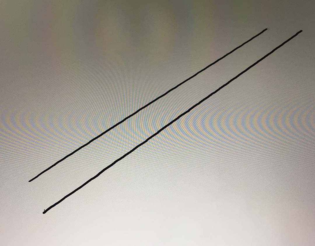 Slight movements of the ruler can be misinterpreted as jitter. Make sure to test with a plastic ruler. Metal objects will wreak havoc with the pen's signal.