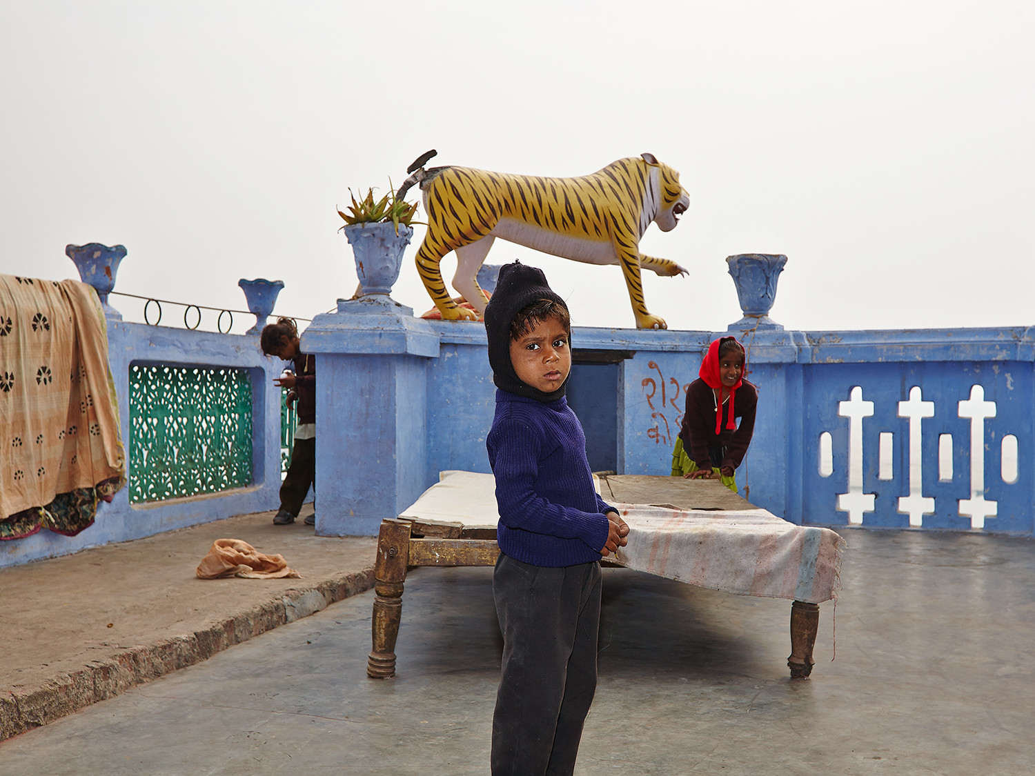 Kids playing hide-and-seek on the terrace