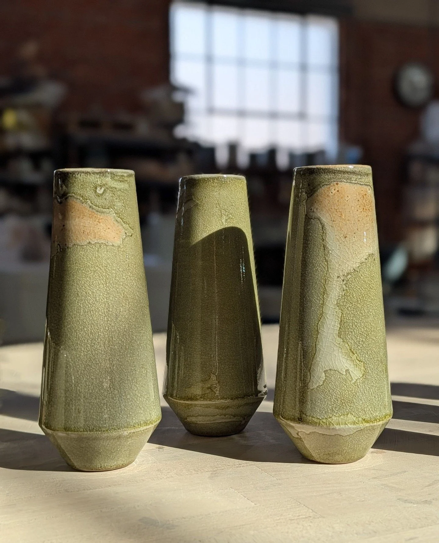 Shino glaze with carbon trapping in the morning light. The green isn't a pigment &mdash; it's trapped carbon.⁠ Glaze chemistry is infinitely trying and delightful. ⁠
⁠
The glaze has a high amount of soda ash, which migrates to the surface as the piec