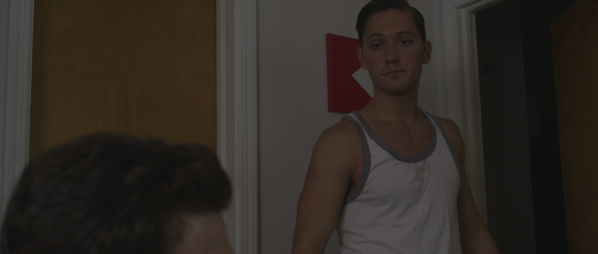 Adam Jepsen as Chris in "Not Our Living Room"