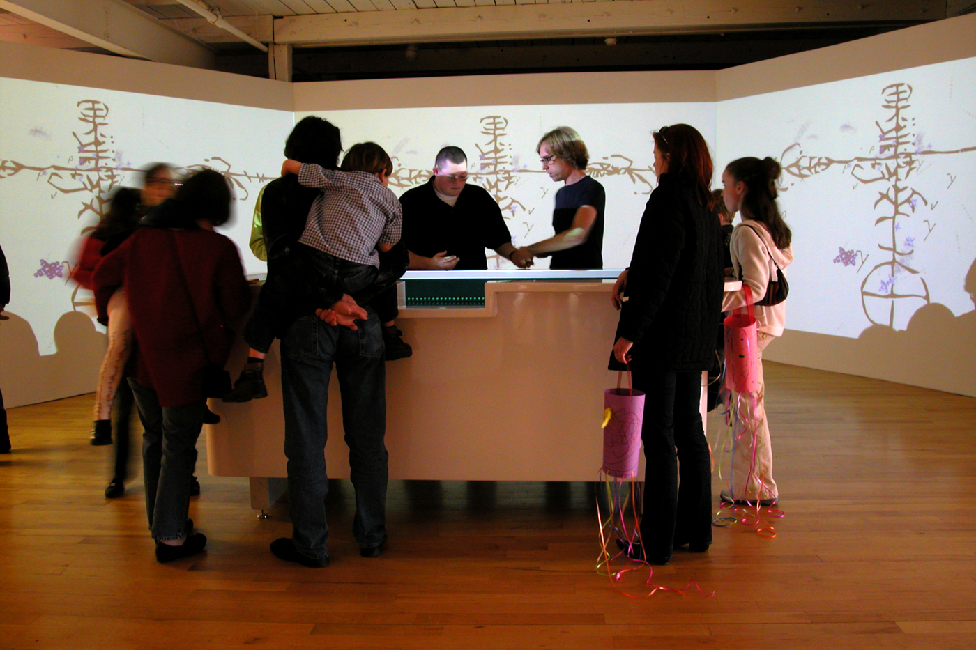Visitors gathered around table