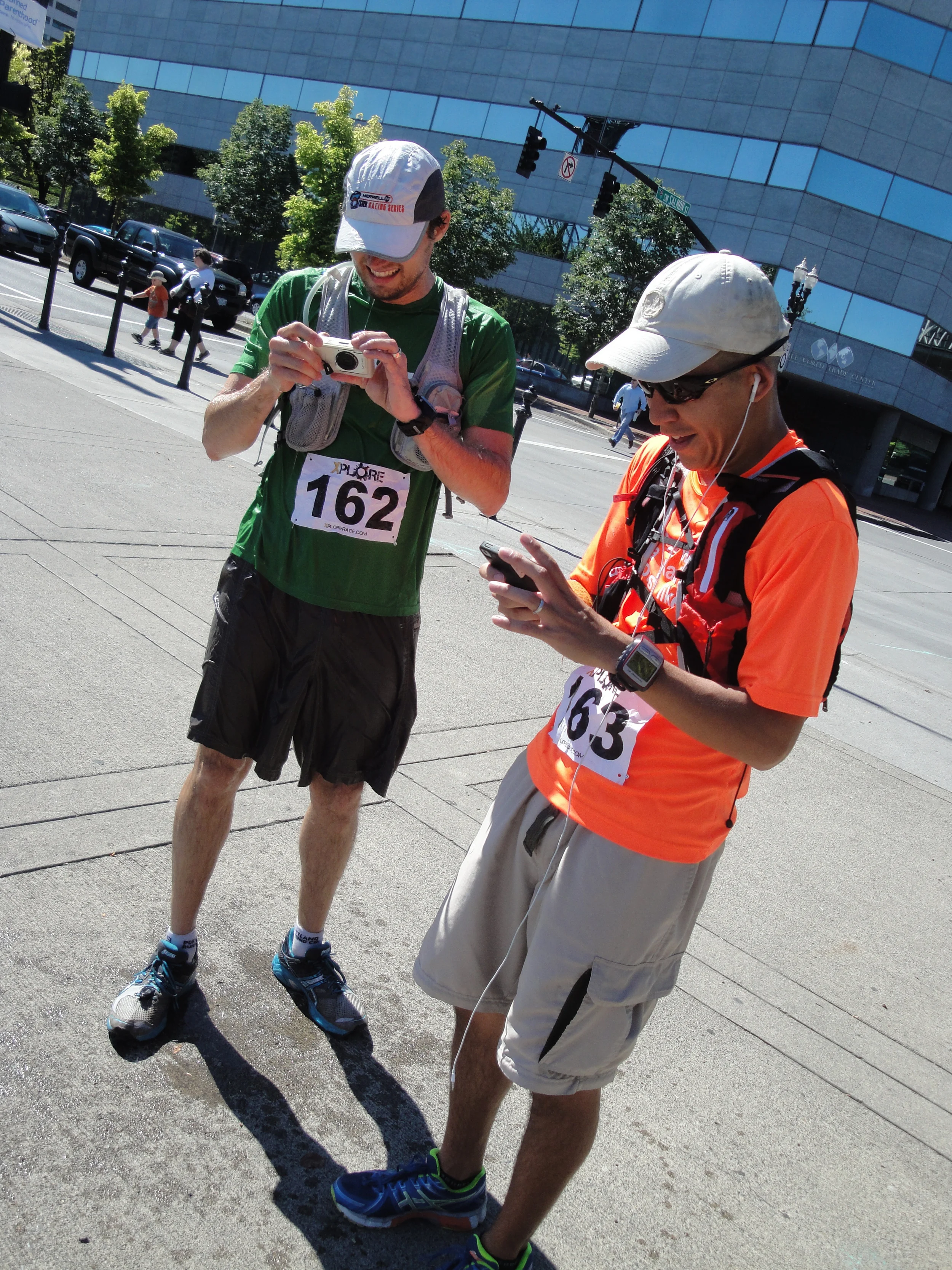 The Nads work their mobile devices to solve clues while communicating with their support team through ear buds