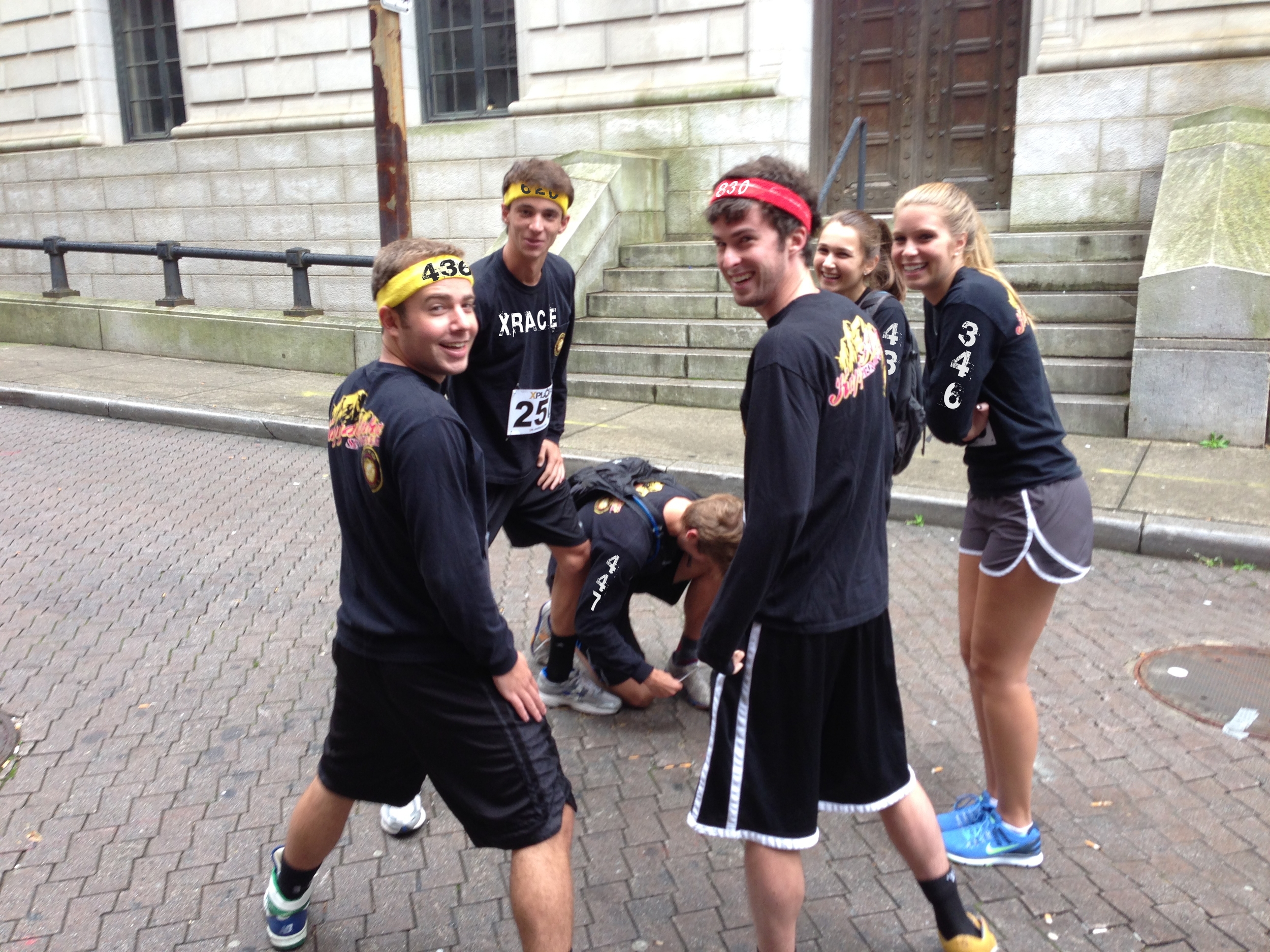 An example of racers displaying their body markings on headbands and long sleeve shirts