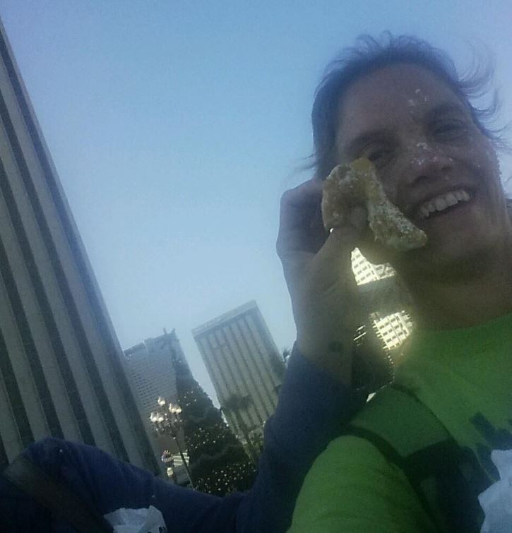 Team Schultz gets a face full of powdered sugar in New Orleans, which eventually mixed with sweat to form a paste all over her phone 