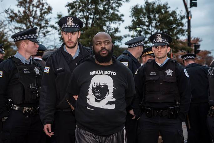 Sarah-Ji of loveandstrugglephotos.com, Timothy Bradford arrested while protesting at the International Association of Chiefs of Police Conference in Chicago on October 24, 2015
