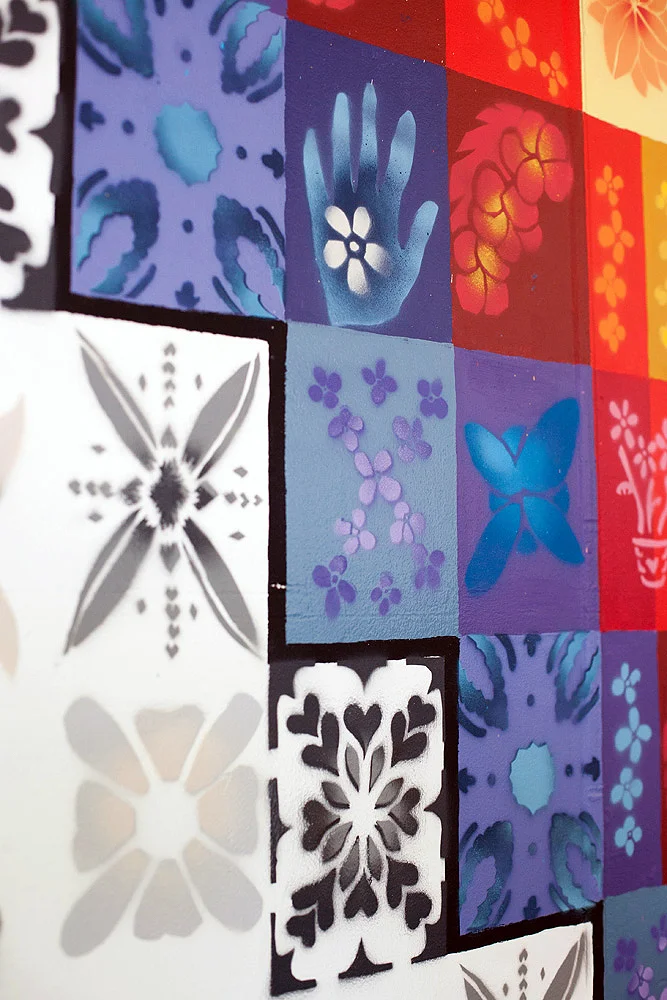 We helped the kids to make stencils of their own designs to use in the mural.