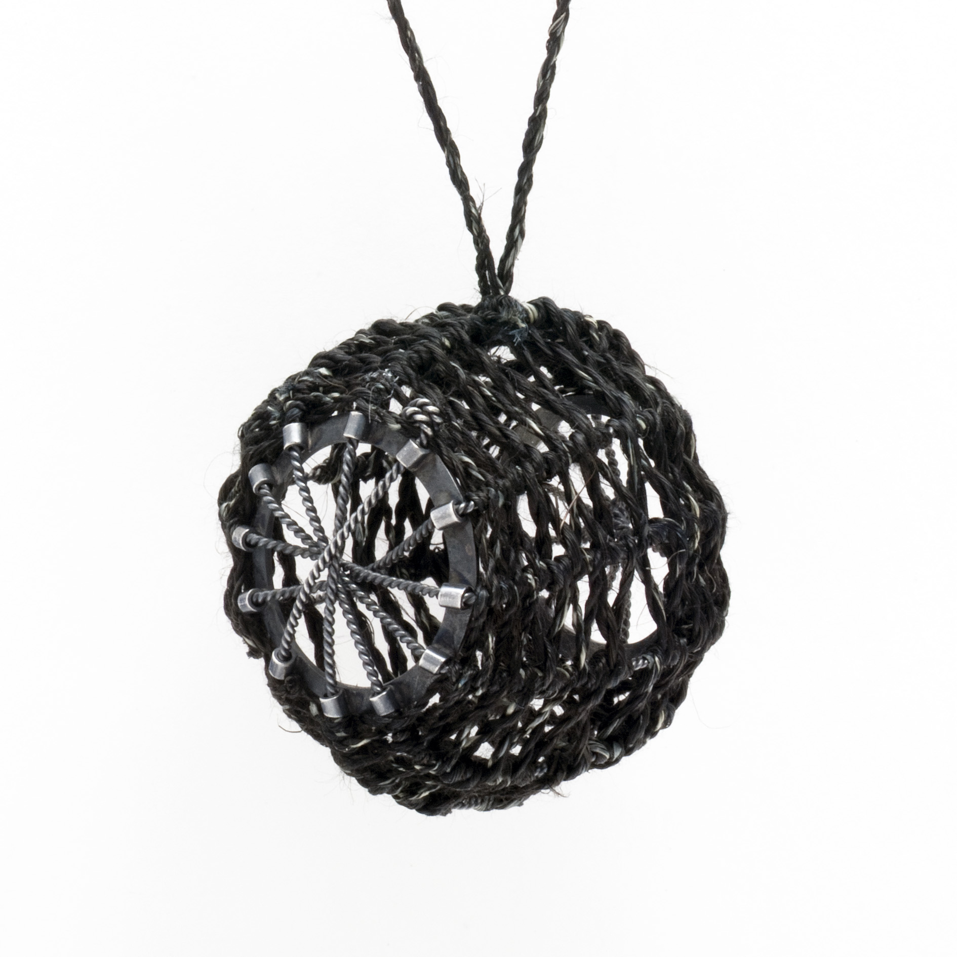 Muka (harakeke/flax fibre), oxidised silver