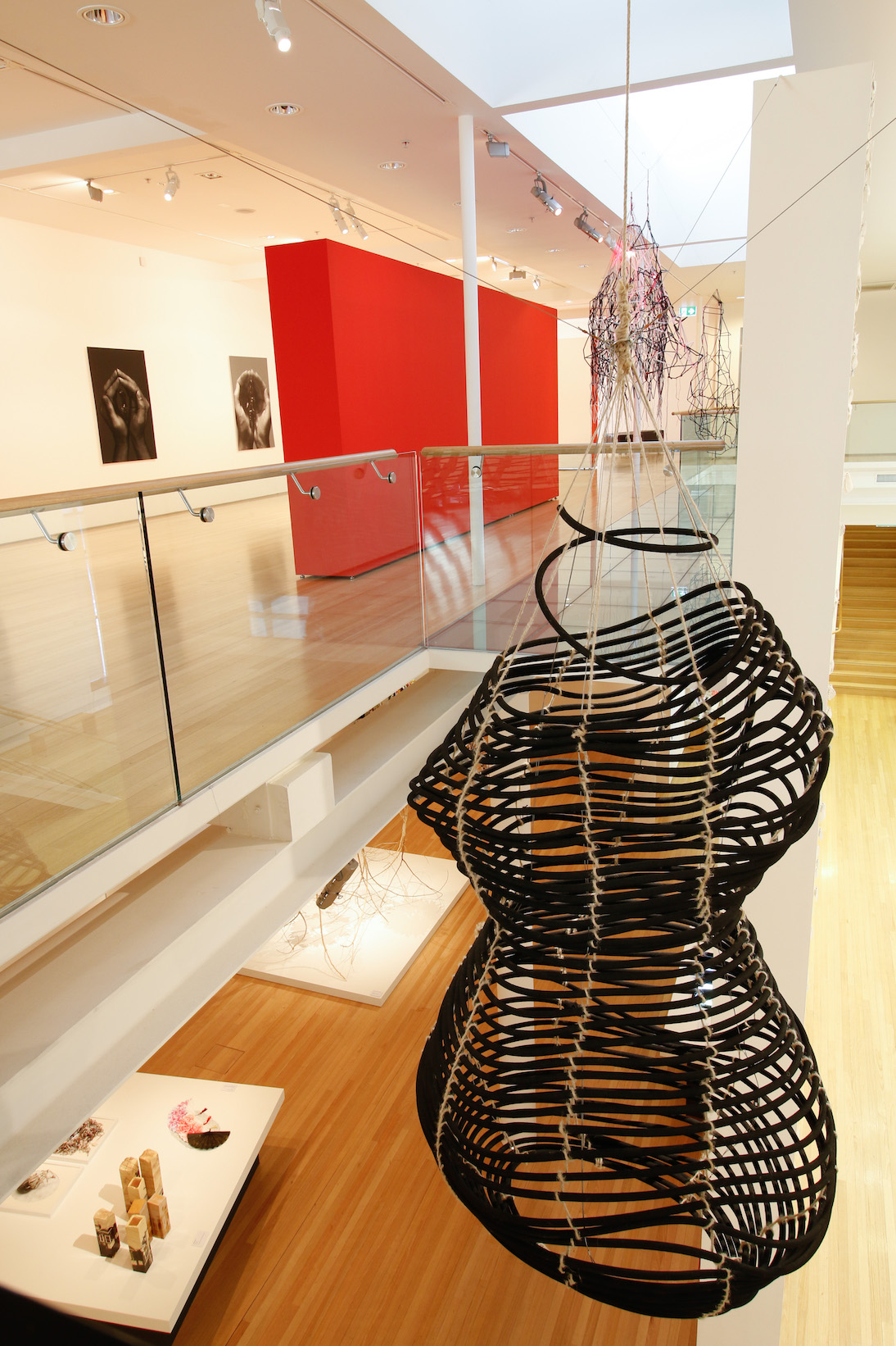 5b No-One, view into hanging sculptures and lower gallery.jpg