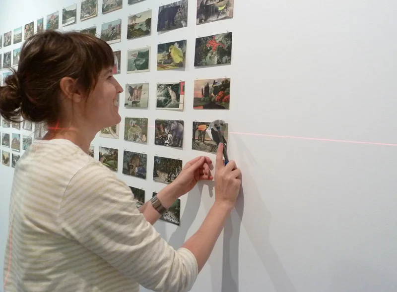 Louise installing By This Unwinking Night , 2012