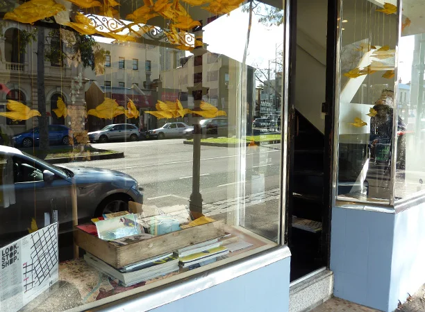 Gracia Haby & Louise Jennison, A Charm of Finches Good as Gold in the window of Milly Sleeping’s Carlton store