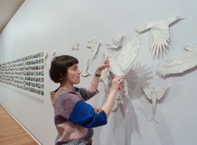 Louise Jennison deinstalling All breathing in heaven at Geelong Gallery