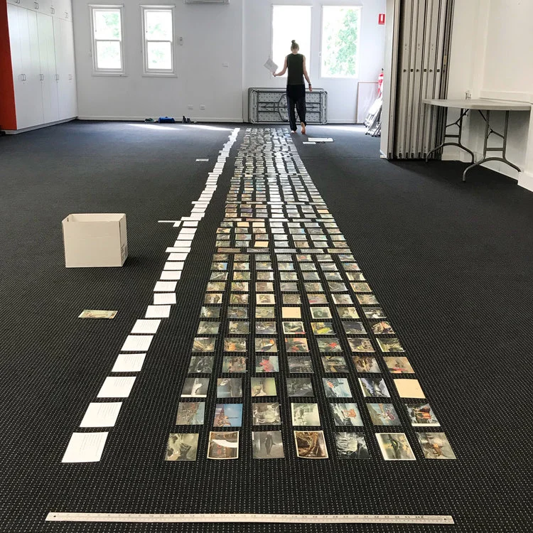 Mapped out on the floor, seventy columns of postcard collages , in preparation for a forthcoming exhibition of our work at Maitland Regional Gallery in the new year