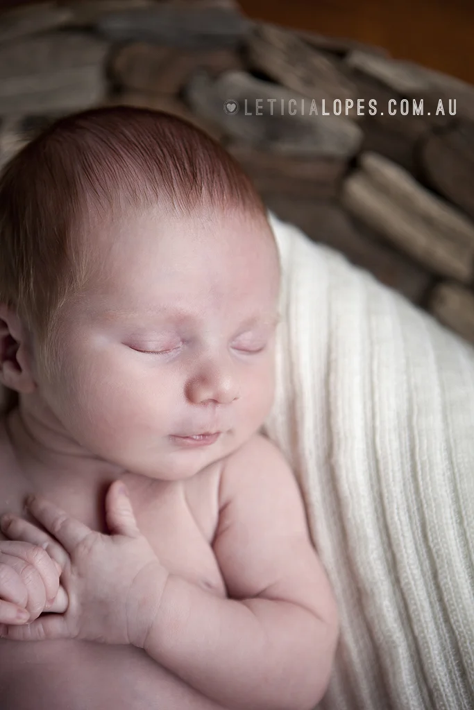newborn-on-basket.jpg