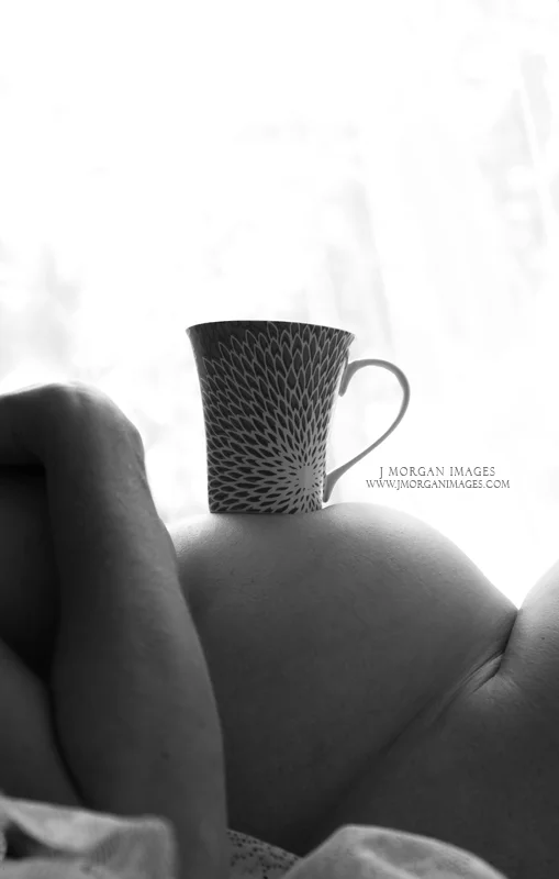 coffee cup on belly