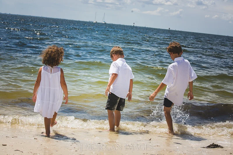 3 kids on a beach