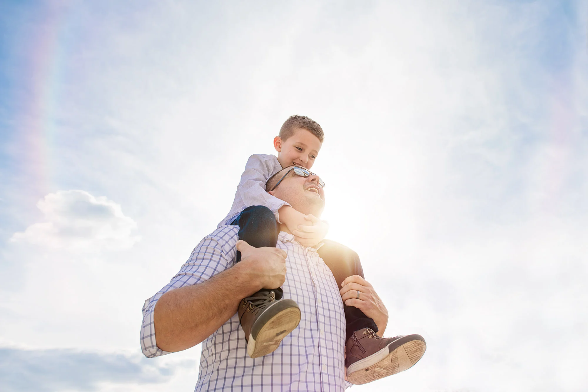 boy on dad's shoulders by kellie bieser.jpg