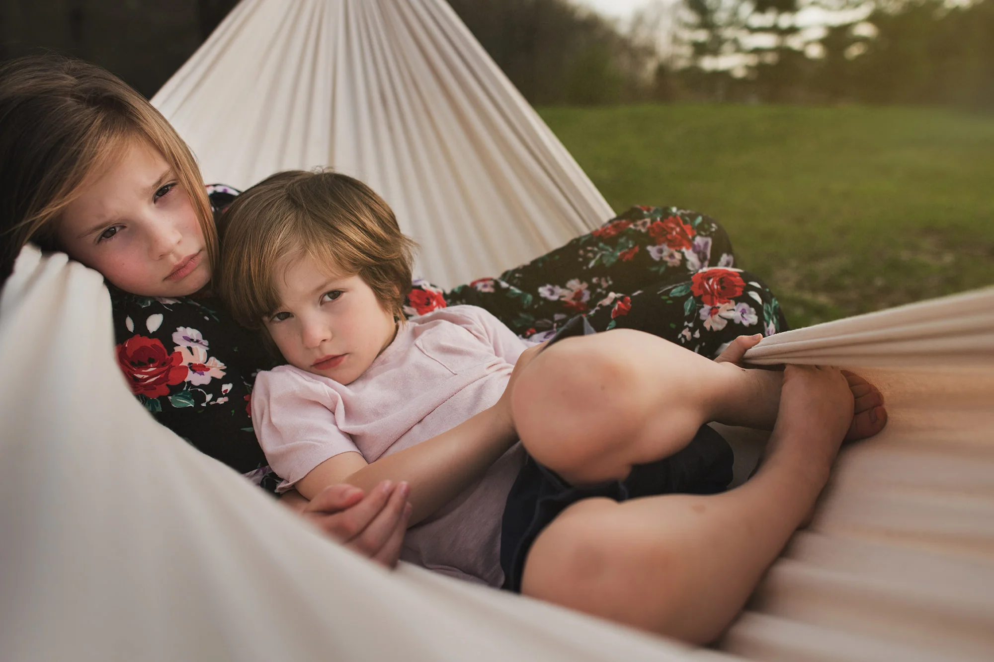 girl and boy laying in hammock kellie bieser.jpg