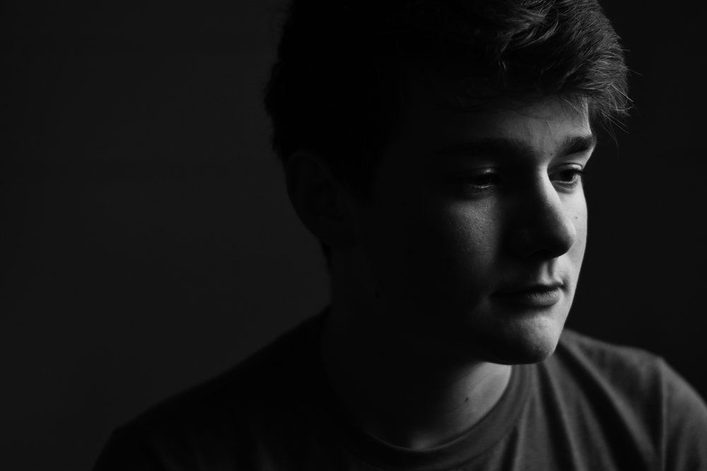 D5600 portrait of teenage boy black and white kellie bieser.jpg