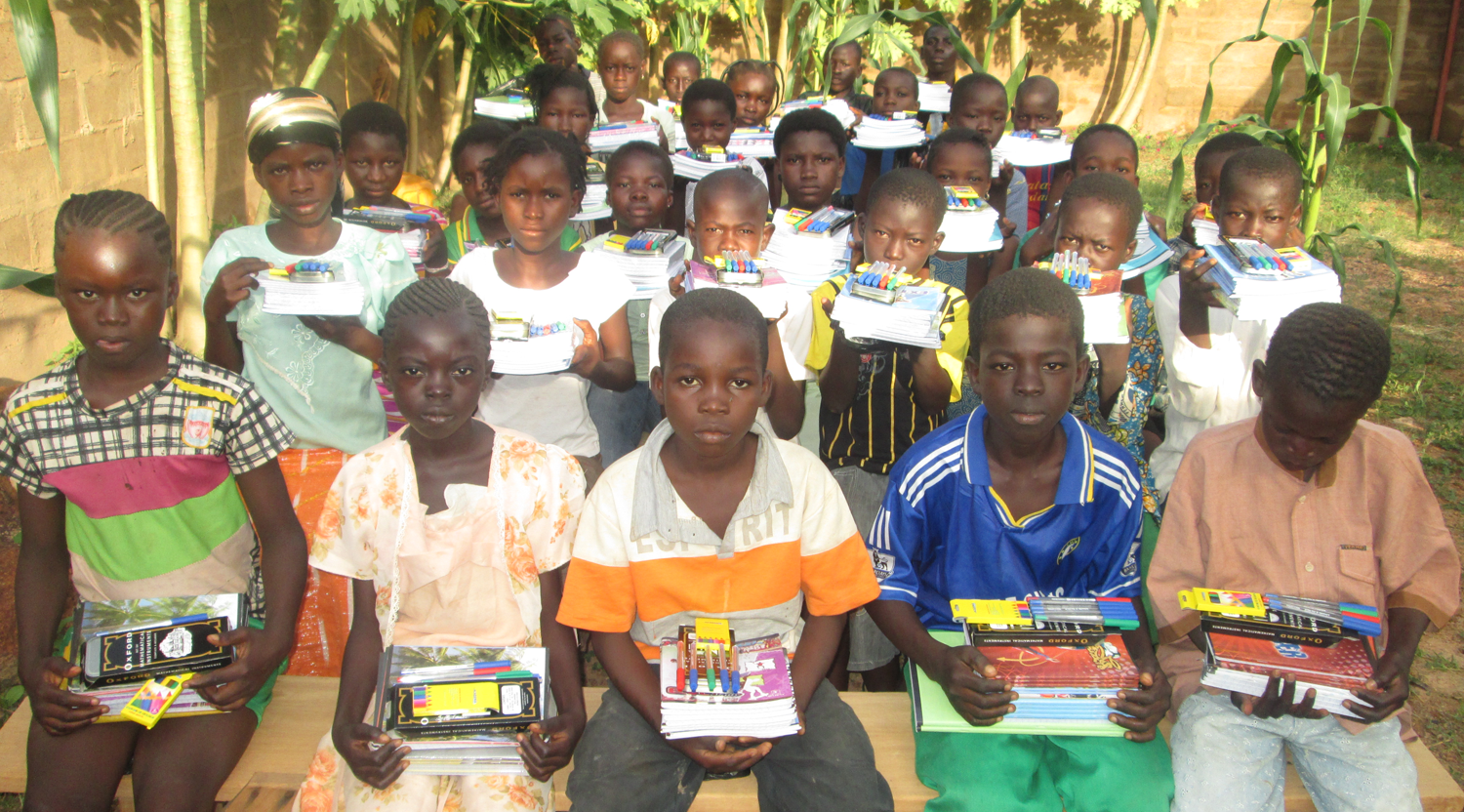 children-with-school-supplies.png