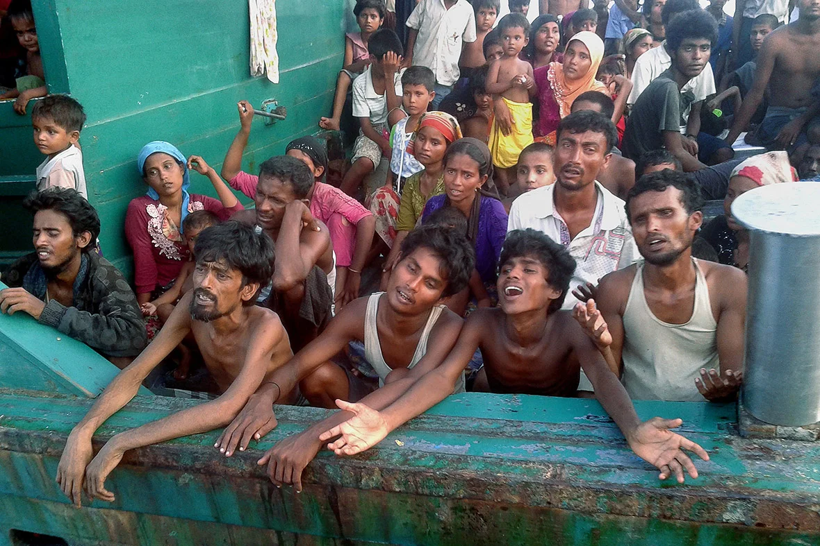 (Christophe Archambault/AFP) Rohingya asylum seekers from Myanmar adrift in the Andaman Sea off the island of Koh Lipe.