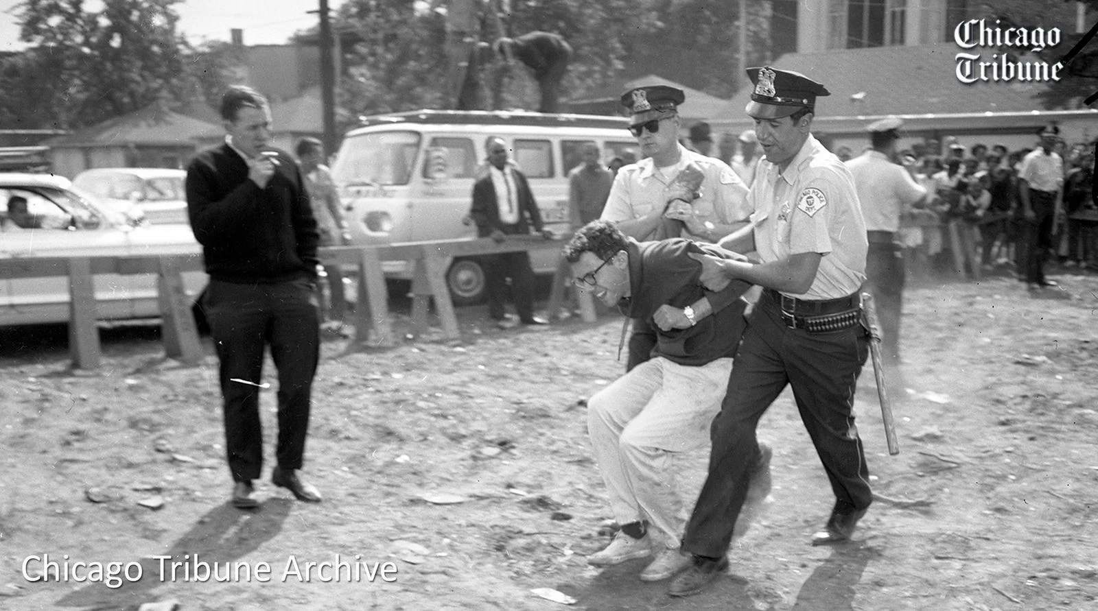 Go Bernie! Careful officer - those are WHITE pants!
