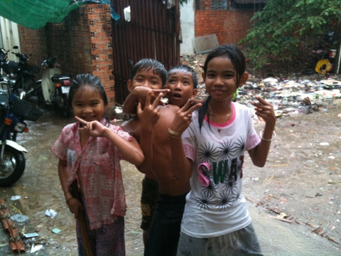 My neighbors during a rain storm, giving "the finger" to exploitation and violence.