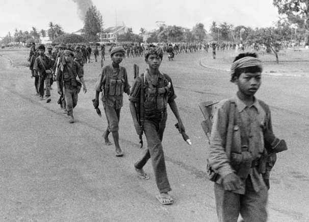 Khmer Rouge child soldiers enter Phnom Penh.