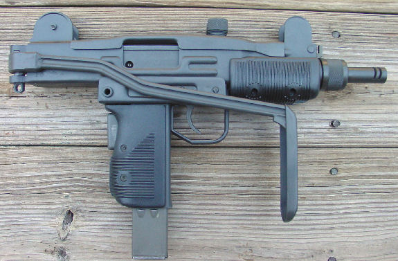 This is a new in box factory vector mini uzi smg. 