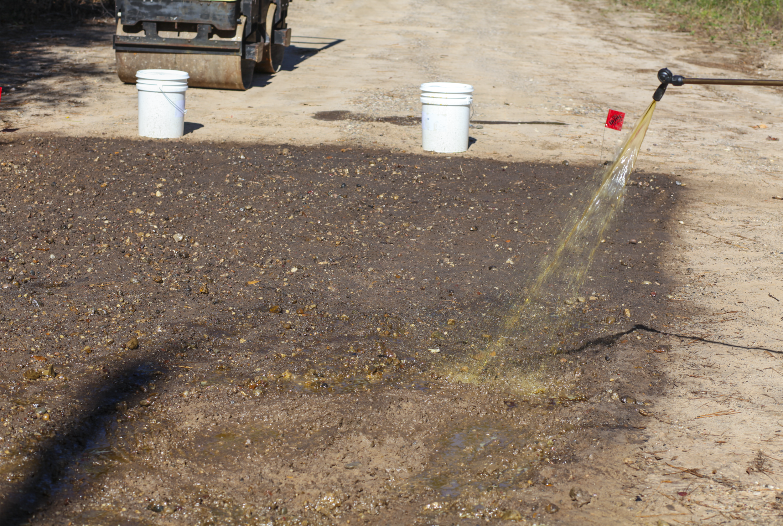 Extending a GS-5 treated road section with a hand sprayer